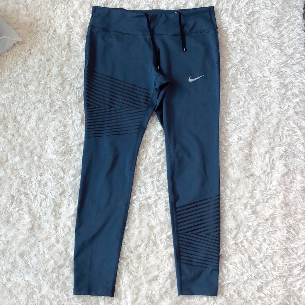 blue NIKE dri-fit leggings